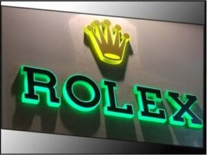Premium Sign Board Dubai featuring illuminated 3D acrylic Rolex logo with LED backlit signage for luxury retail branding